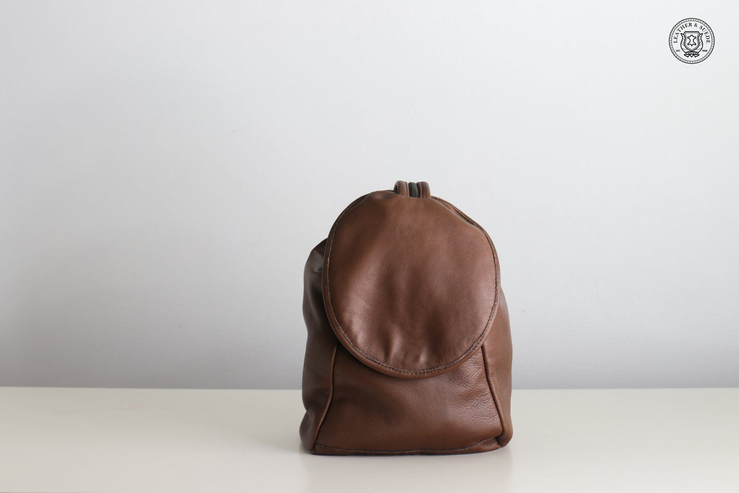 Round Flap Backpack