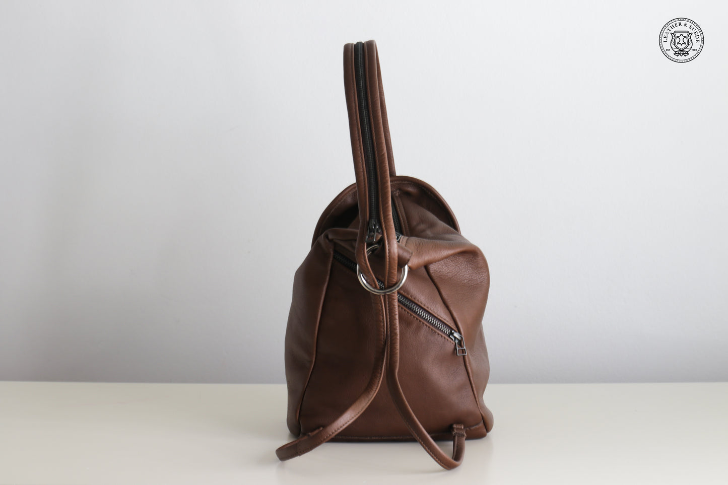 Round Flap Backpack