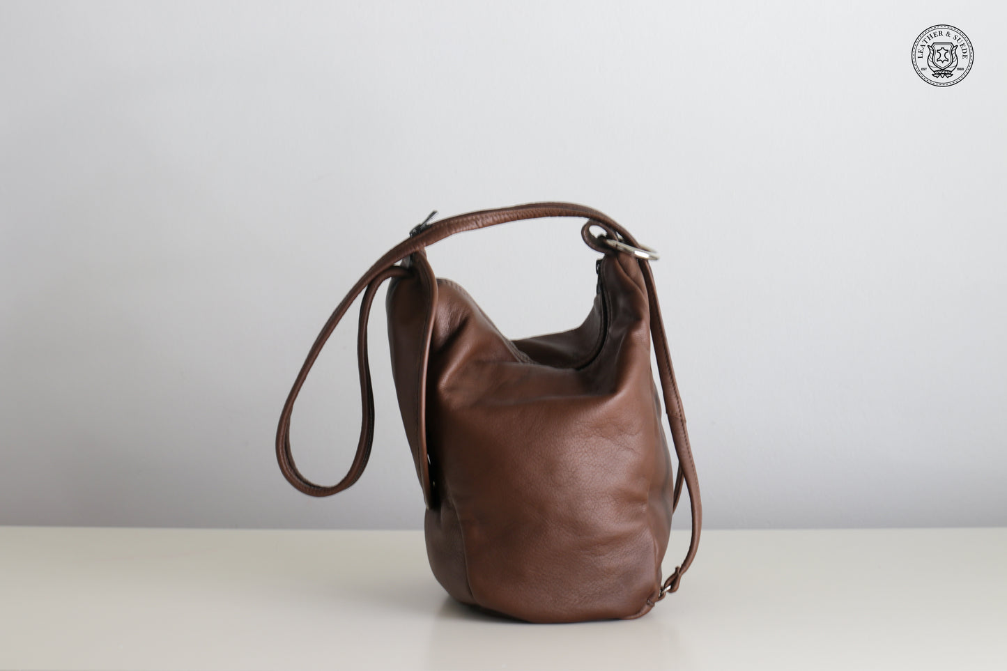 Round Flap Backpack